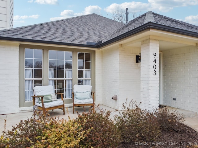 property entrance with a patio