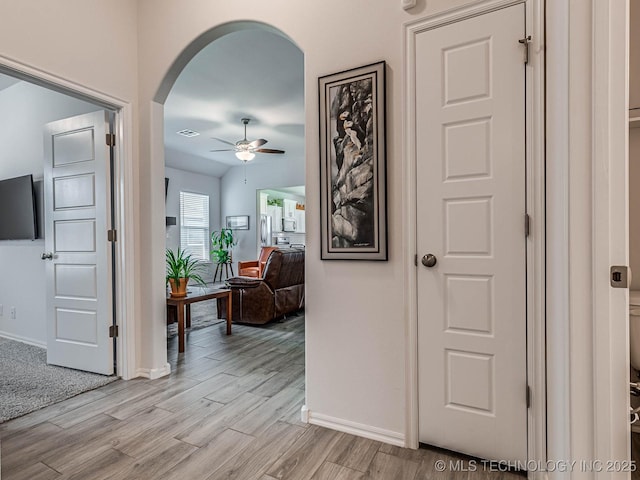 hallway featuring light hardwood / wood-style flooring