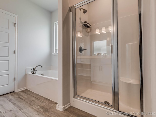 bathroom featuring plus walk in shower