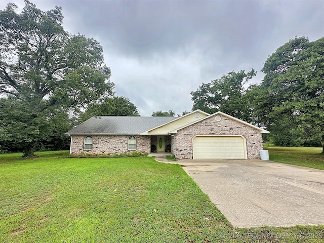 ranch-style home with a garage and a front yard