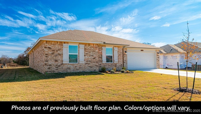 ranch-style house featuring a garage and a front yard