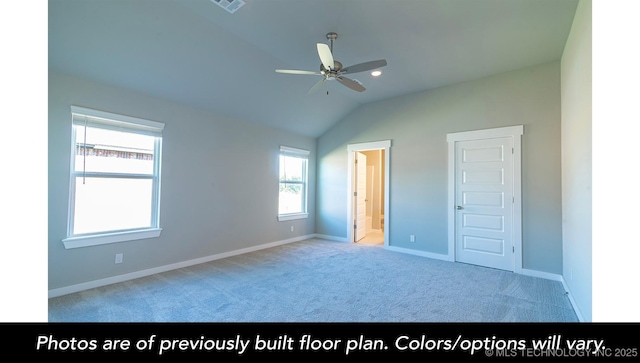 unfurnished bedroom with ceiling fan, ensuite bath, lofted ceiling, and light carpet