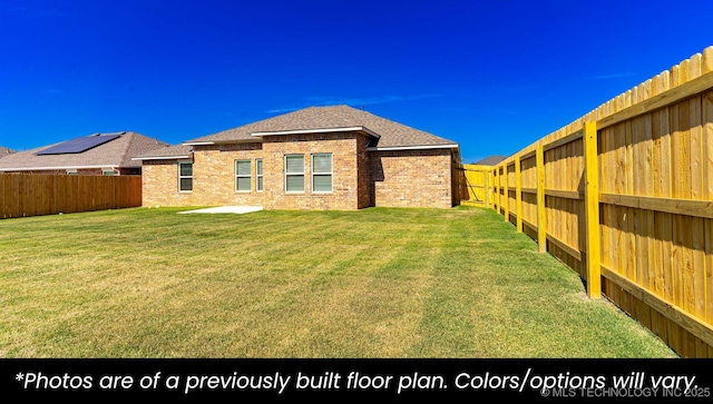 exterior space with a yard and a patio area