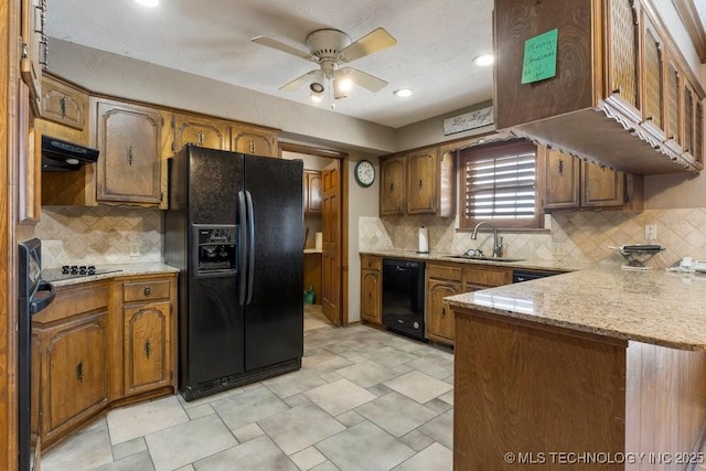 kitchen with black appliances, sink, backsplash, ceiling fan, and kitchen peninsula