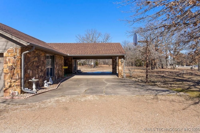 exterior space featuring a carport