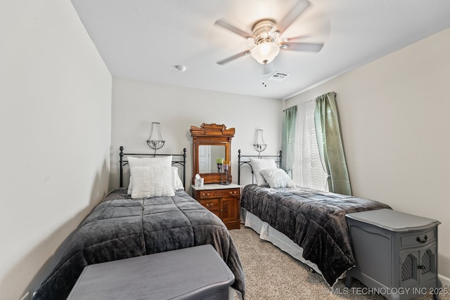 bedroom featuring ceiling fan and light carpet