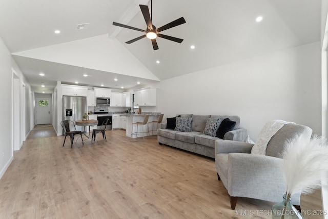 203 W Monroe Ave, Mcalester, OK 74501 - living area with a ceiling fan, beam ceiling, high vaulted ceiling, recessed lighting, and light wood-type flooring