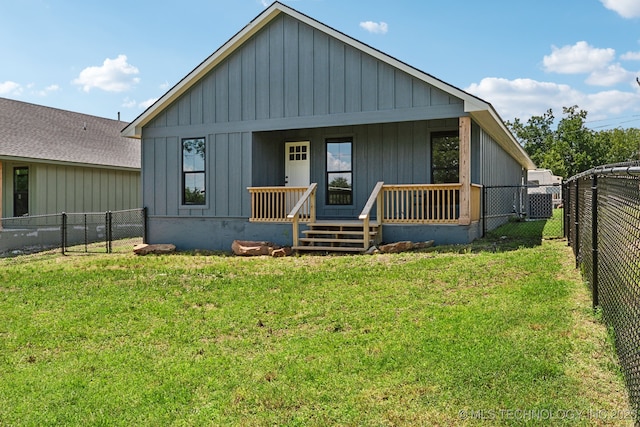 203 W Monroe Ave, Mcalester, OK 74501 - view of front of home featuring a porch and board and batten siding