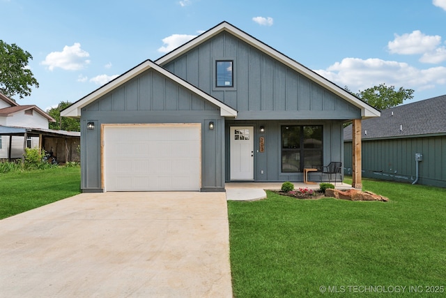 203 W Monroe Ave, Mcalester, OK 74501 - view of front of property with board and batten siding, an attached garage, concrete driveway, and a front lawn