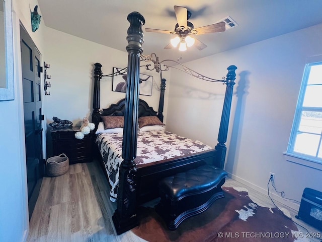 bedroom featuring hardwood / wood-style flooring