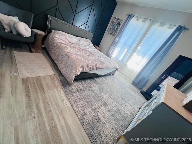 bedroom featuring light hardwood / wood-style flooring