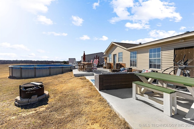 view of yard with an outdoor living space and a patio