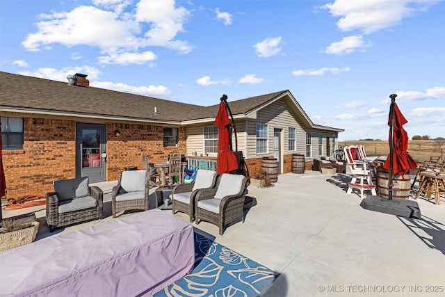 view of patio with an outdoor hangout area