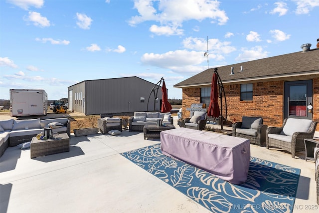 view of patio / terrace with a grill and an outdoor hangout area