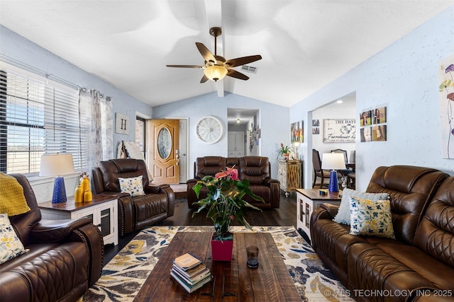 living room with lofted ceiling, wood-type flooring, and ceiling fan