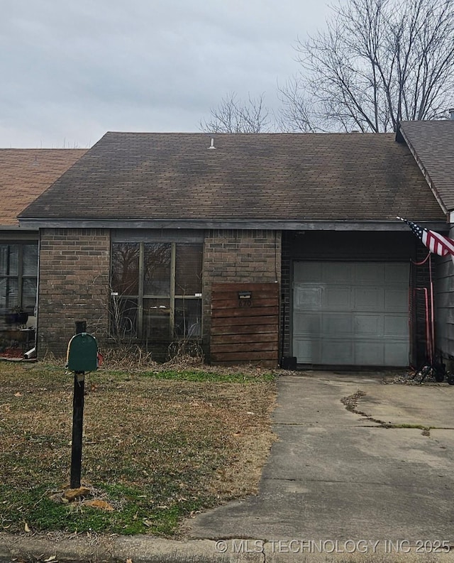 single story home with a garage