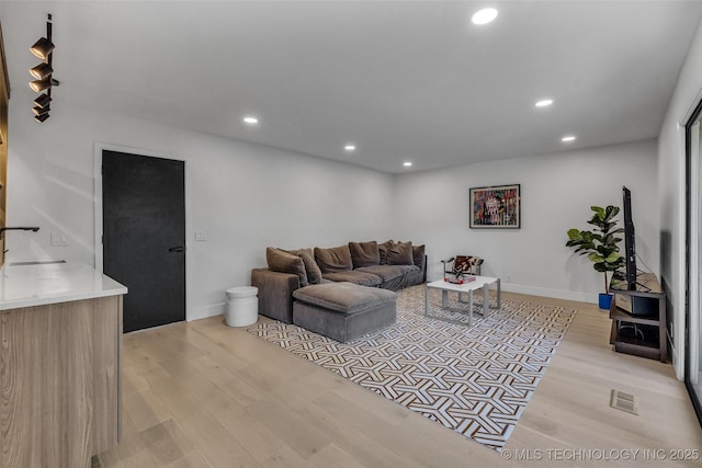 living room featuring light hardwood / wood-style floors