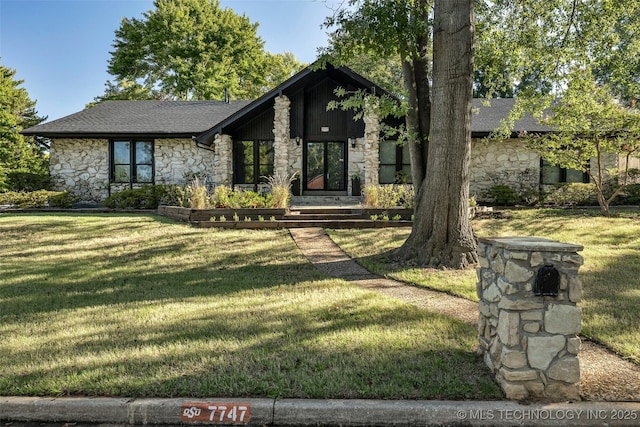 view of front of home with a front lawn