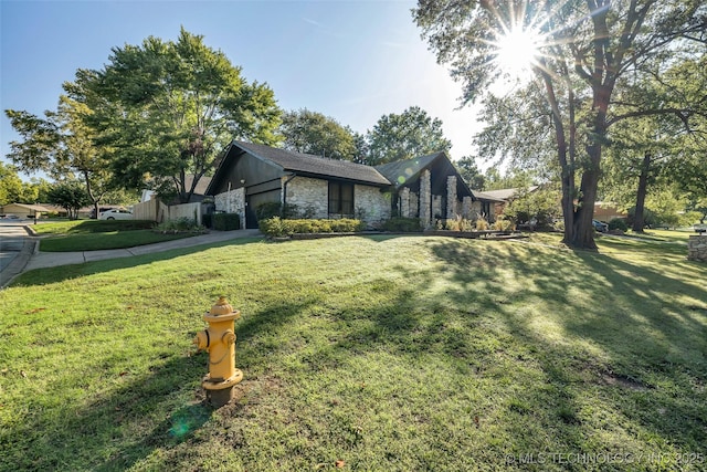 view of front of property with a front lawn