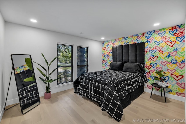 bedroom with wood-type flooring