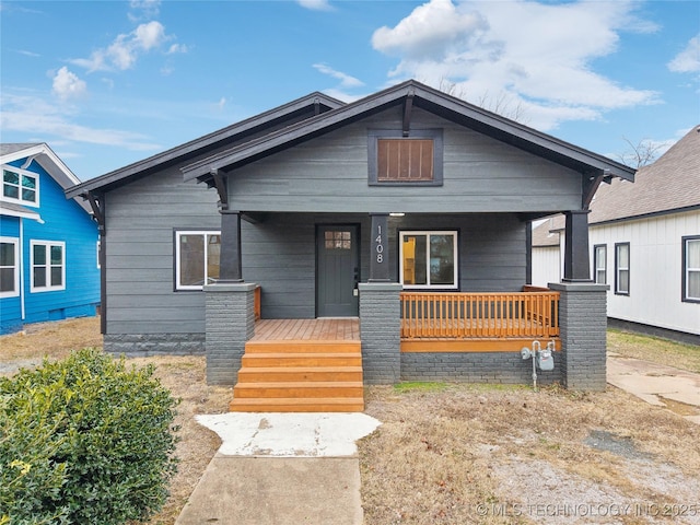 bungalow-style house featuring covered porch