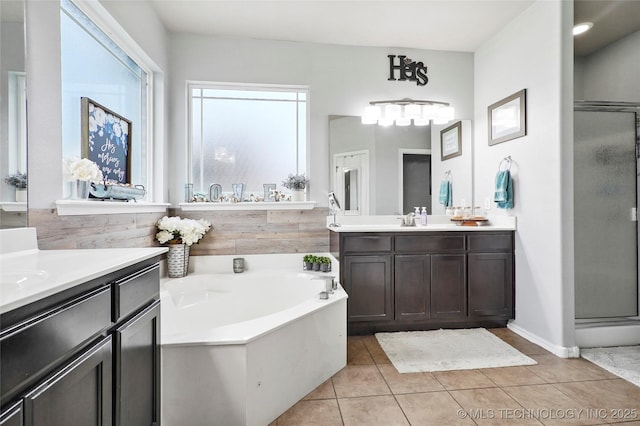 bathroom with vanity, separate shower and tub, and tile patterned flooring