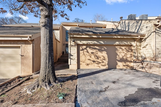 exterior space featuring a garage