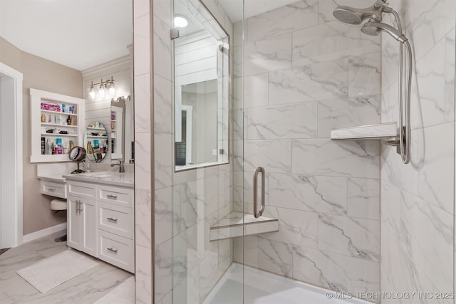 bathroom featuring vanity and an enclosed shower