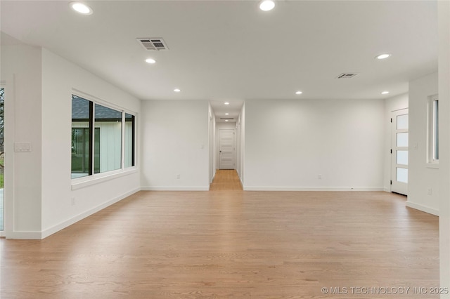 unfurnished living room featuring light hardwood / wood-style flooring