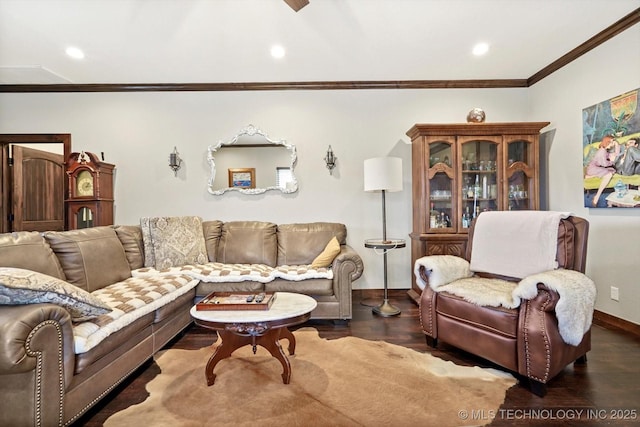 living room with crown molding and dark hardwood / wood-style flooring