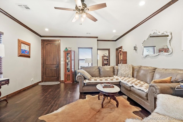 living room with ornamental molding, dark hardwood / wood-style floors, and ceiling fan