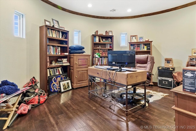 home office featuring dark hardwood / wood-style flooring and ornamental molding