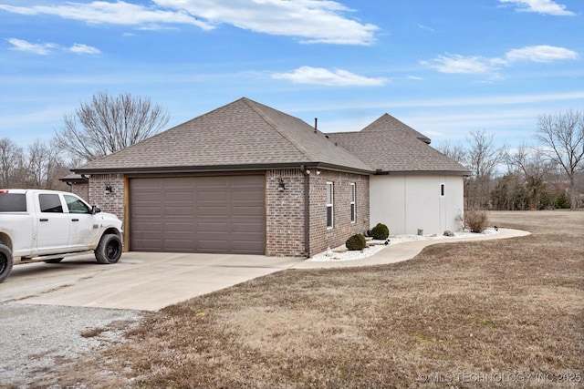 view of property exterior featuring a garage and a lawn