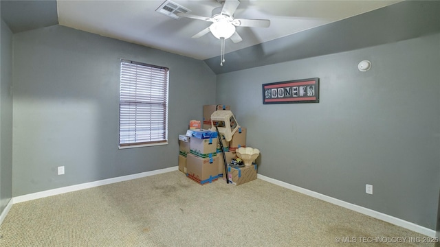 playroom with ceiling fan, lofted ceiling, and carpet