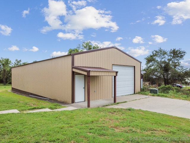 garage with a yard