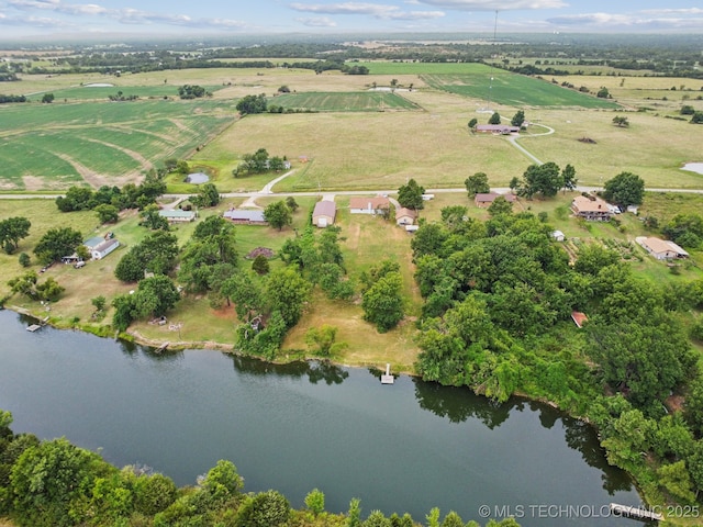 birds eye view of property with a water view and a rural view