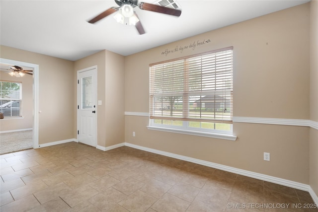 entrance foyer featuring ceiling fan