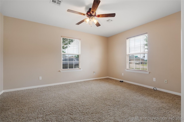 empty room featuring ceiling fan