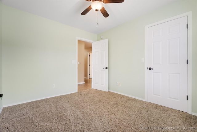 interior space featuring ceiling fan