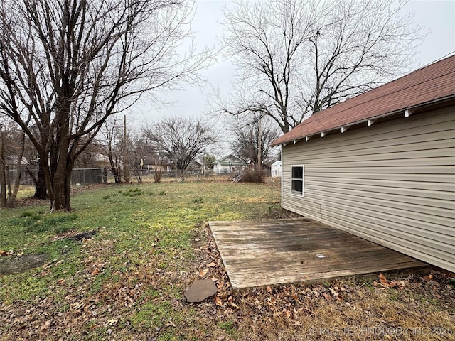 view of yard with a wooden deck