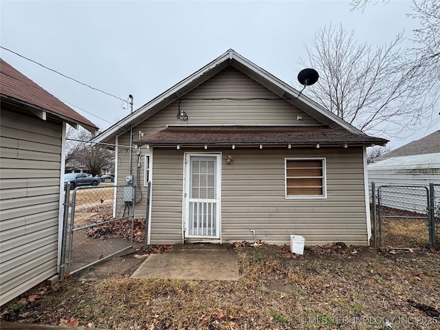 rear view of house featuring a patio