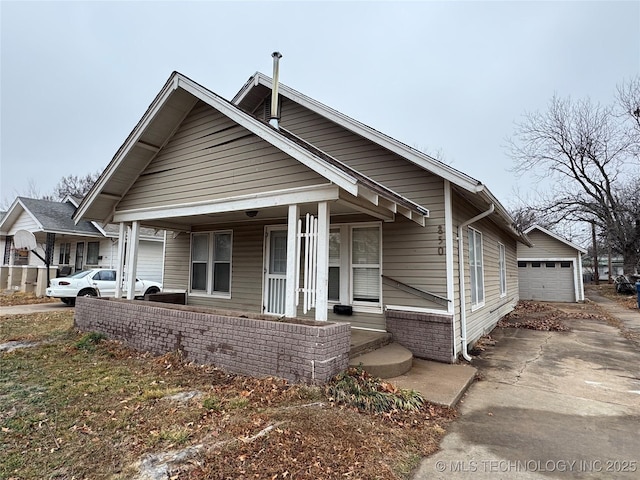 view of front of house with a porch and a garage