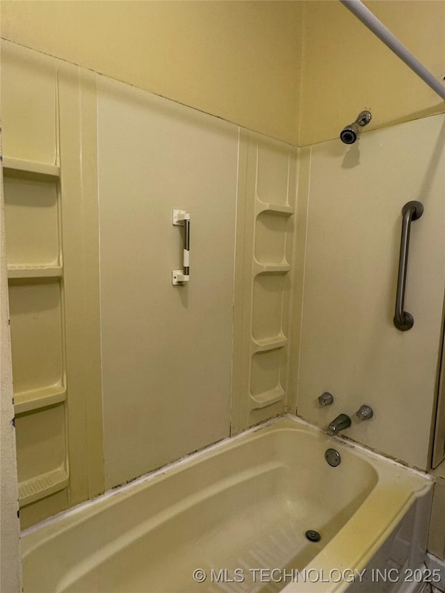 bathroom with shower / tub combination