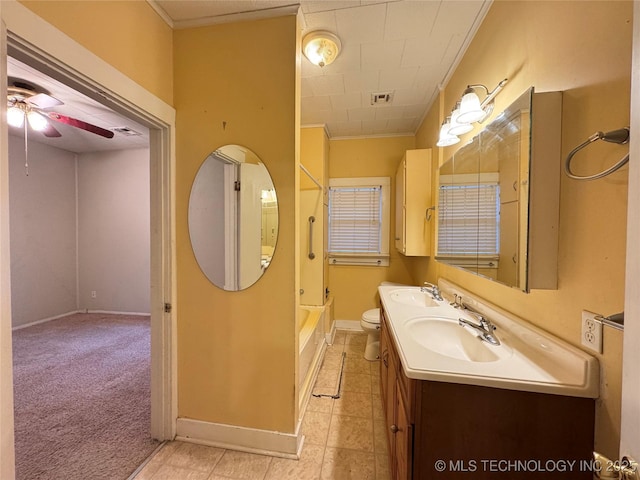 full bathroom featuring crown molding, ceiling fan, vanity, and toilet