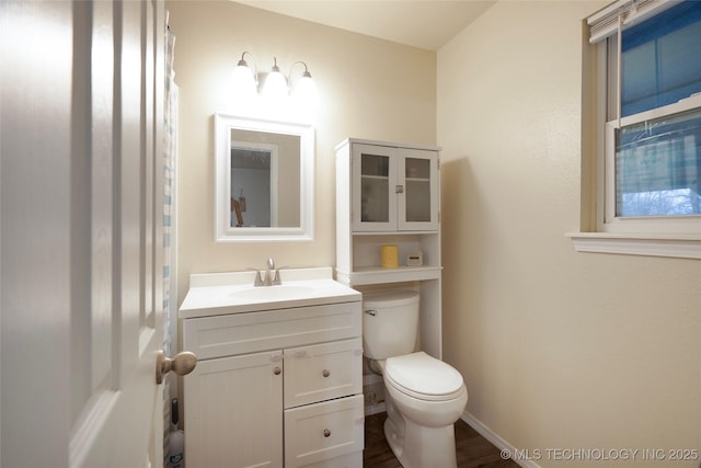 bathroom with vanity and toilet