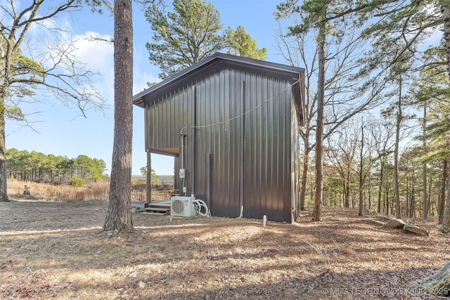 view of outdoor structure with ac unit