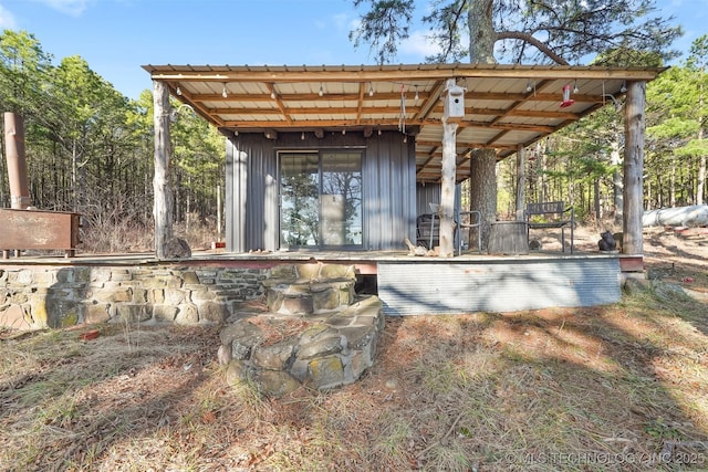 view of patio / terrace featuring an outbuilding