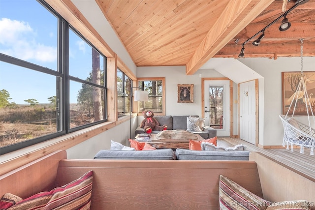 living room featuring track lighting, wooden ceiling, lofted ceiling with beams, and wood-type flooring