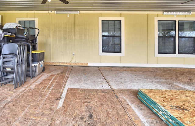 exterior space featuring ceiling fan