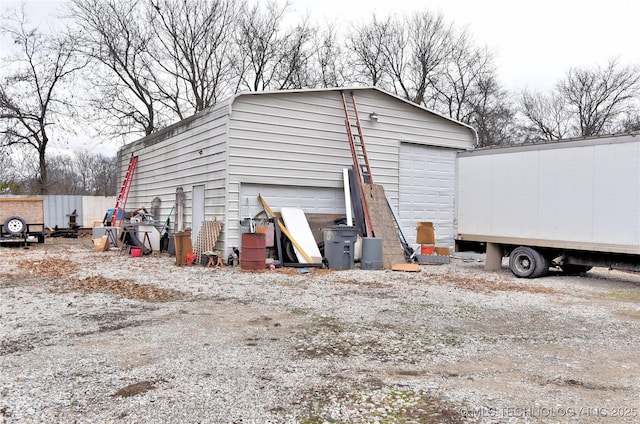 view of outbuilding with a garage